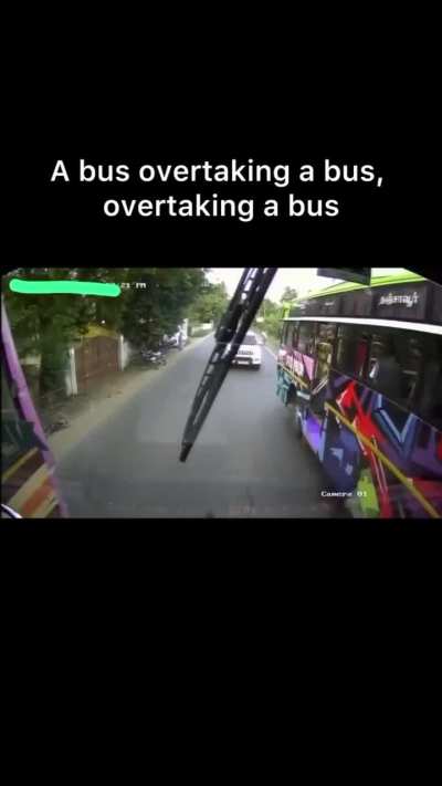 A bus overtaking a bus overtaking a bus