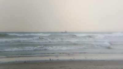 I was taking photos on the beach when I heard some singing