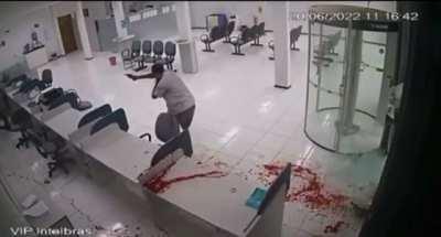 Robber tries to kill bank security guard, loses via artery shot