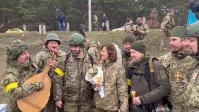 Congratulations to the two volunteer soldiers, Lesya and Valeriy, who got married today near the frontline in Kyiv. Live long!