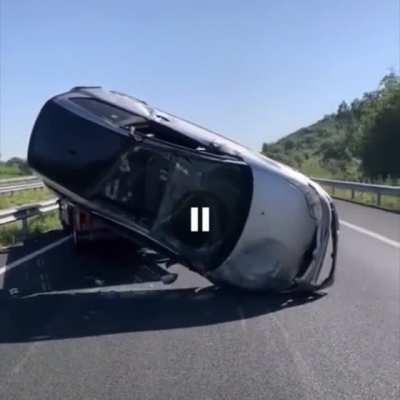 Man is clotheslined while trying to roll over a car with his tow truck