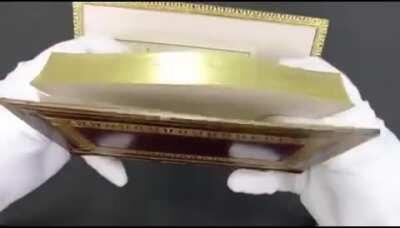 Painting hidden along books edge