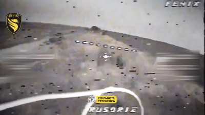 A russian soldier is chased by a Ukrainian drone, he crashes his bike after a jump and gets hit. Phoenix group, September 2025.