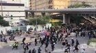 Hong Kong police charge towards protesters
