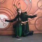 Little girl hugging Loki with her squeaking shoes while saying 