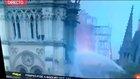 Who the f is this?? Notre Dame, they said NO workers were on site. You can clearly see water being sprayed on the left. Who is this person running around inside the Church? That is clearly not a firefighter dressed like that.