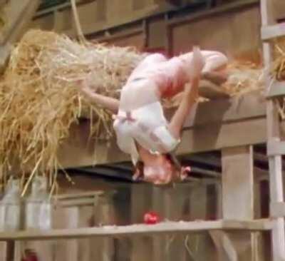 The way she successfully picked up the apple and go back to starting position