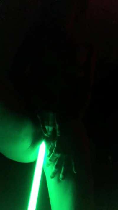 She knows how to use a lightsaber.