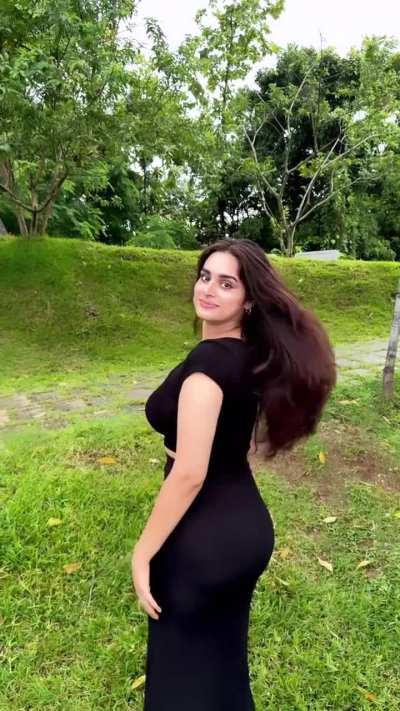 Seductive curves in black dress