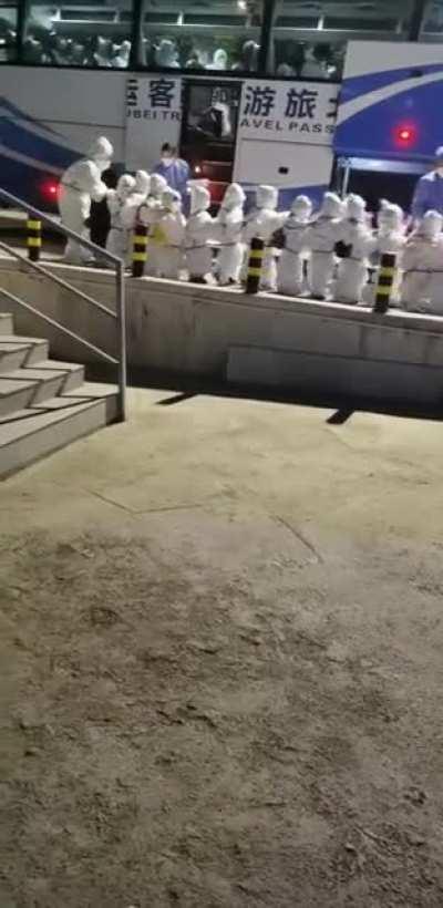 Live in Guangzhou, kids are being taken away to quarantine camp.