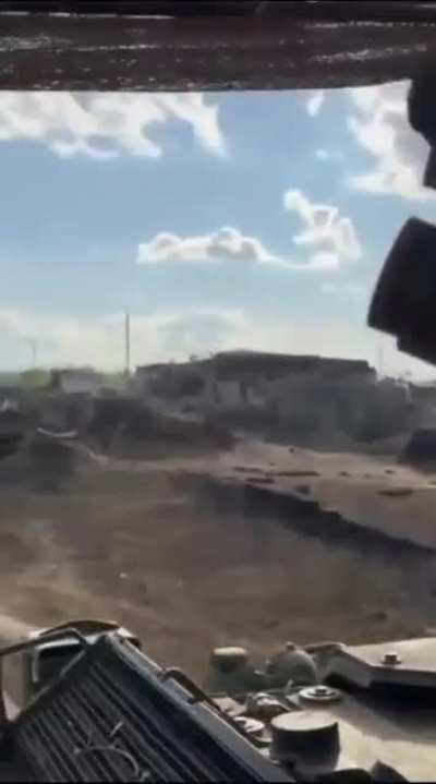 Ukrainian troops cross the russian border driving past empty russian fortifications on their M1126 Stryker