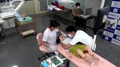 Robot for dentist training