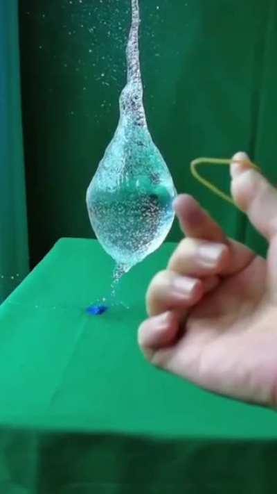 Slo mo water balloon pop