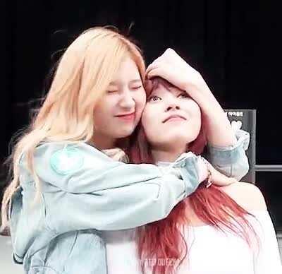 Sana aggresively cuddling Mina