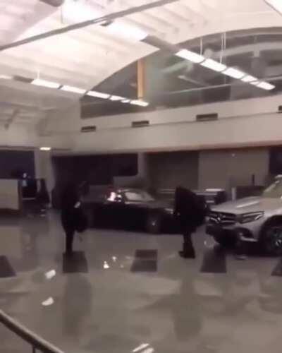 Breaking into AMG showroom and destroying all the cars