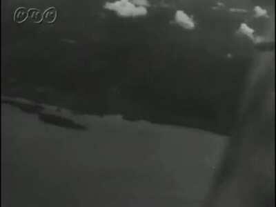 Japanese Navy Yokosuka D4Y1 “Suisei” or “Judy” dive bombers conduct an aerial reconnaissance mission over Guadalcanal flying over Henderson Field and other airfields on the Island (1943)