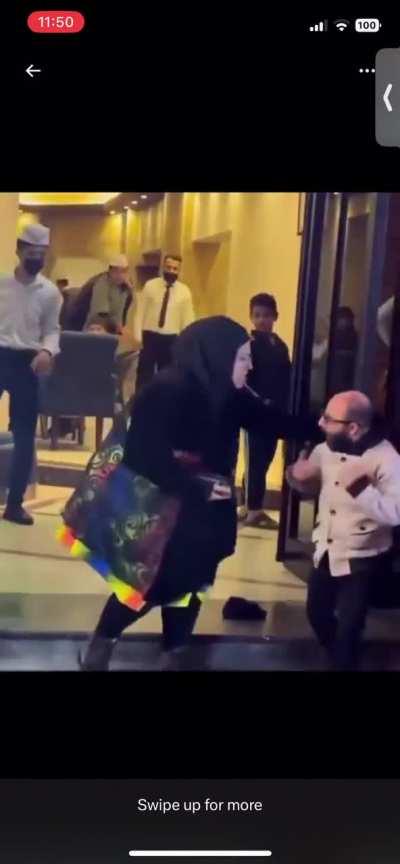 Shuli having a domestic dispute with his wife