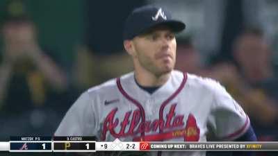 Freddie Freeman gives a little girl his batting gloves after being hit with a ricochet foul ball.