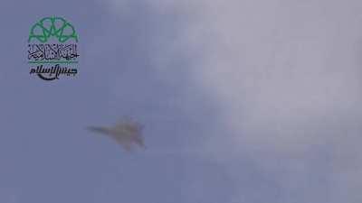 SyAAF MiG-29 comes around for a gun run on the cameramans position - 2014