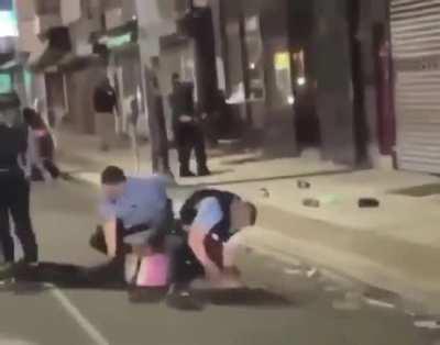 The cop literally put that man's hand on the stick just so he could have a reason to beat him up