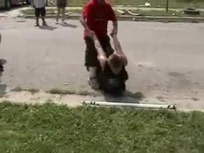 Curb stomped on to florescent light bulb