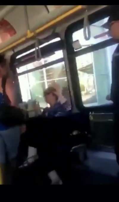 Woman spits and gets knocked out cold by a slap.