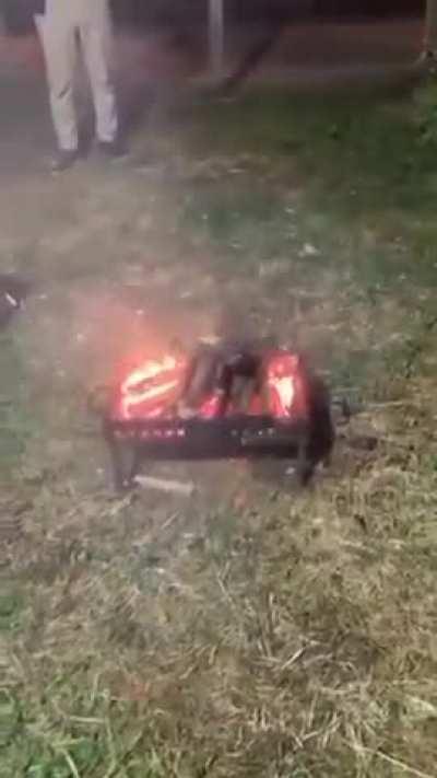 To use a drone for stoking the fire.