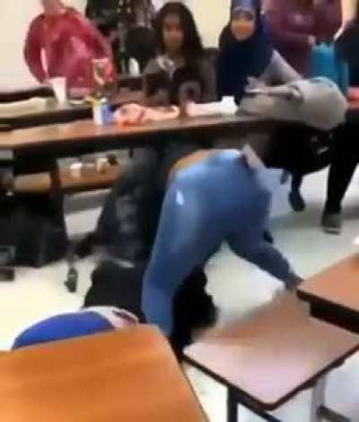 Fat white girl punches Muslim girl in school unprovoked and the teacher does nothing; black hero comes in and beats the b*tch and the teacher tells her off