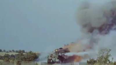 Sherman tank blown up for a 1966 French military feature pokes itself in the turret ring