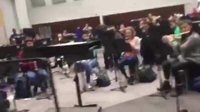 College band class pranks director by playing Mii Channel theme instead of a Bach Chorale