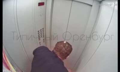 Guy checks if his vodka is flammable in an elevator