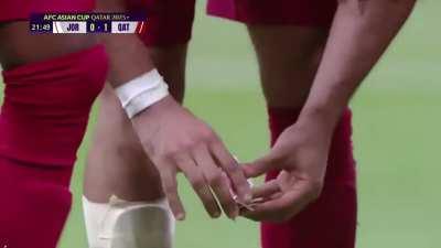 Qatar’s Akram Afif pulls a badass magic trick after scoring in the Asian Cup Final. (S is his wife’s initial, spot the wink at the end.)