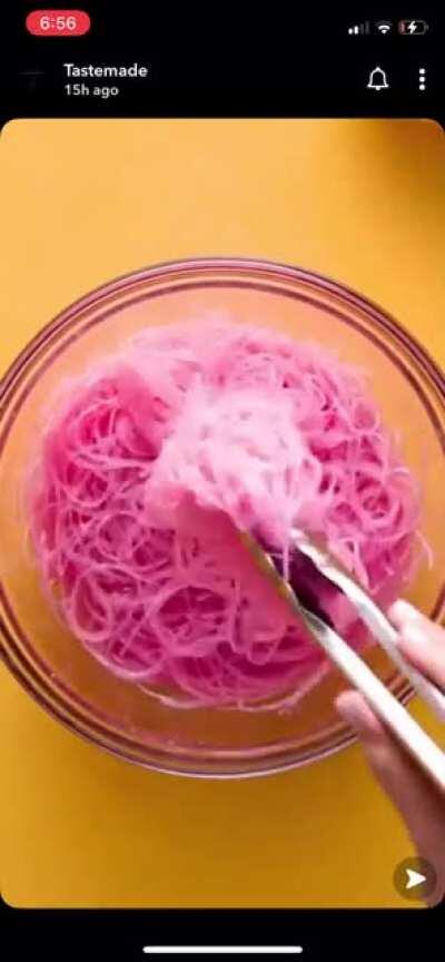 Unseasoned rainbow trash topped with egg