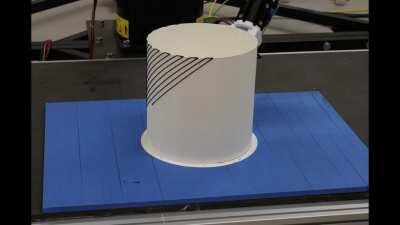 Olaf, our robotic arm happily printing curved layers