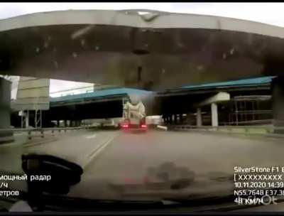 Bridge falls on passing car