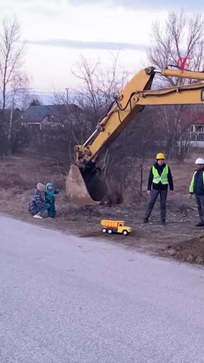 When big machines and men meet little boys with trucks