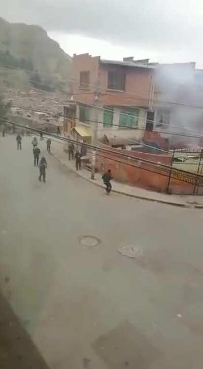 guy throws grenade at police, then other explosive on his pocket ignites