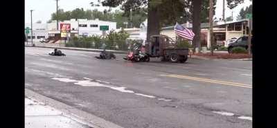 Truck had right of way as they were a registered member of the parade that was and had been in progress on a section of roadway that was closed to traffic for the parade and the motorcycle pulled out onto the parade route heading in the opposite direction