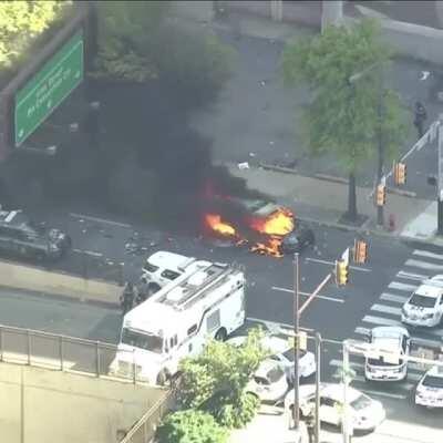 Torched police cruiser in center city