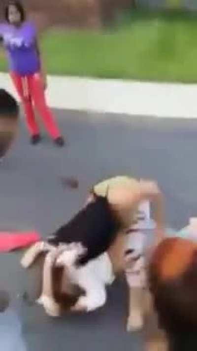 She whooped her ass and sat on her like a chair while making a statement