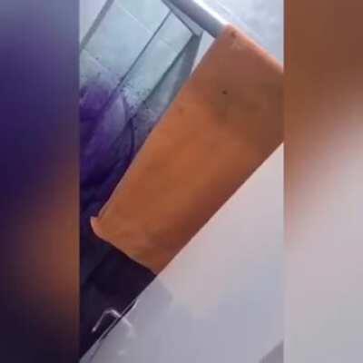 Man gets pranked with Purple Dye in shower. Becomes Grape-Man at Airport.