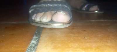 Crushing insects with sandals