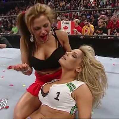 Mickie kisses an unconscious Trish