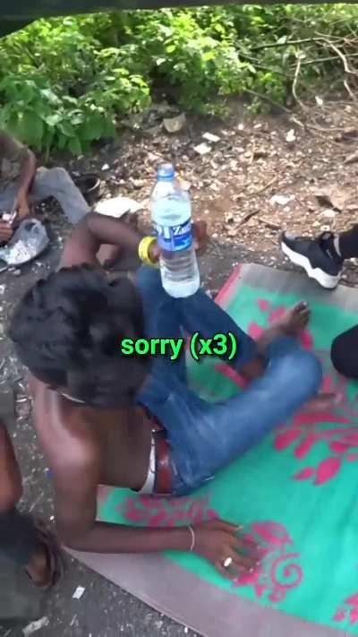 vlogger goes to random pipes in India, acts like MC then tricks them into saying racist slur