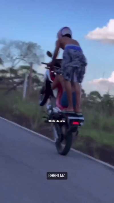 Daredevils on motorcycle