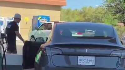 What could go wrong trying gas up a Tesla?