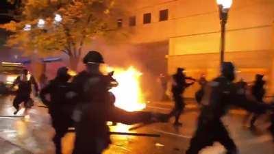 Molotov almost hits Officer in Portland.