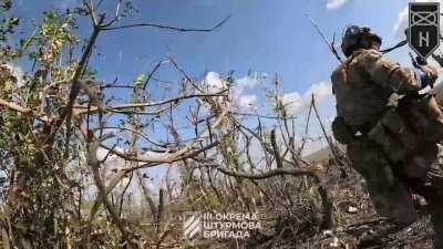 Headcam footage from a Ukrainian soldier clearing Russian positions with gunfire and grenades near Bakhmut (posted by 3rd Assault Brigade)