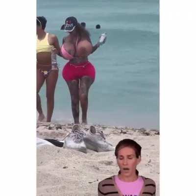 A girl rescuing a sea creature