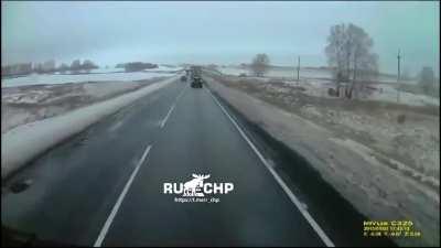 Driver and 2 passengers die from hitting a truck during a risky overtake